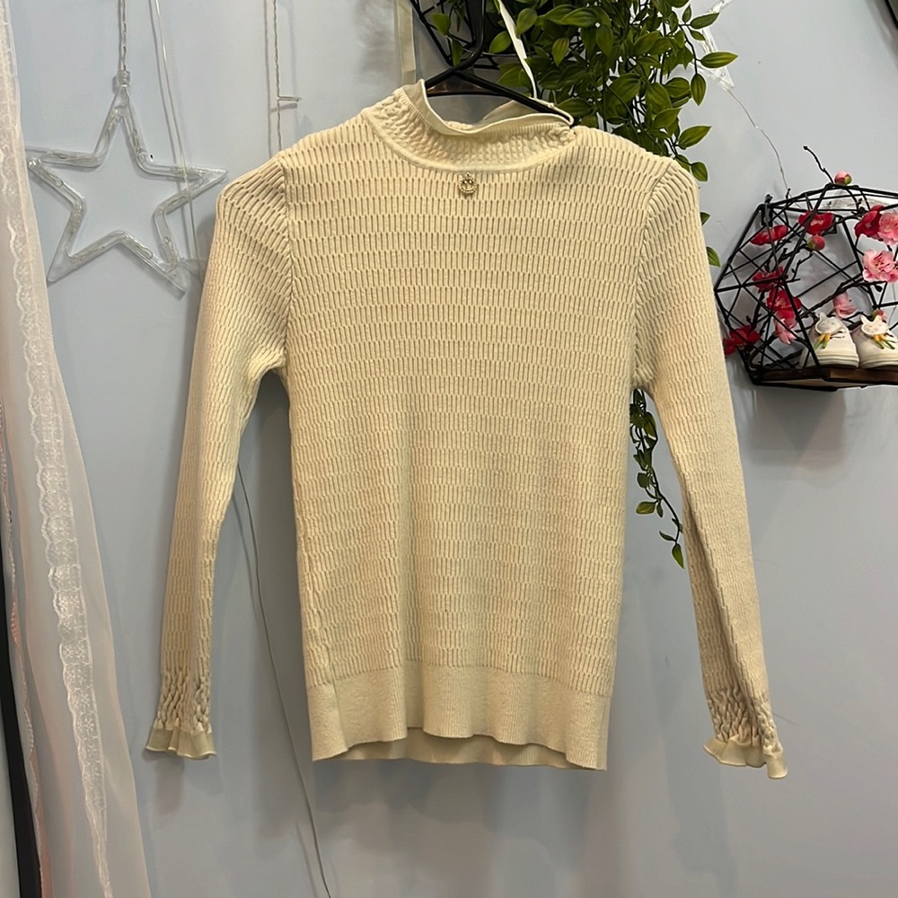 Cream turtleneck